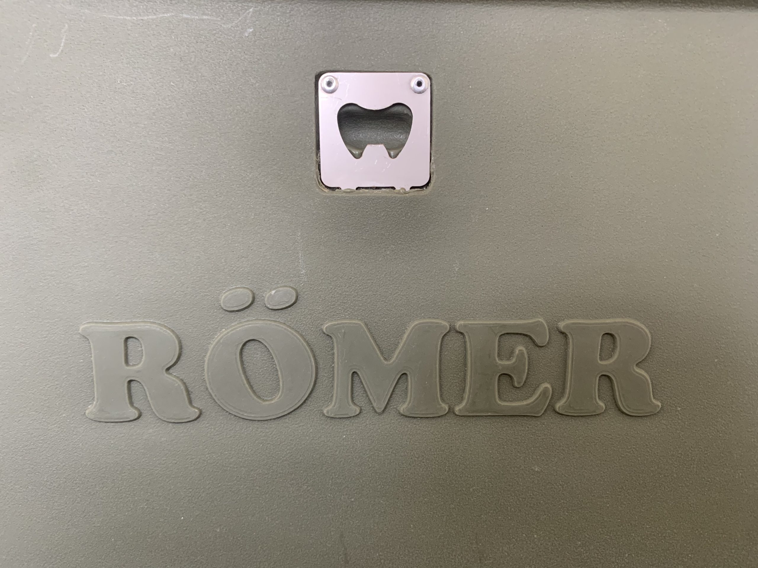 BOTTLE OPENER UNDERSIDE THE LID